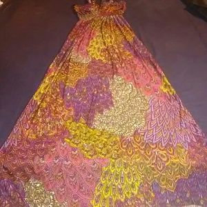 A long silky vibrant colored dress